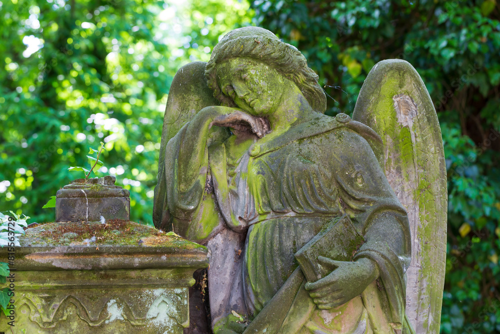 Historic Statue on the mystery old Prague Cemetery, Czech Republic