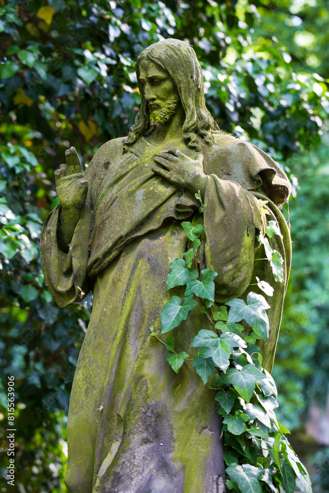 Historic Statue on the mystery old Prague Cemetery, Czech Republic