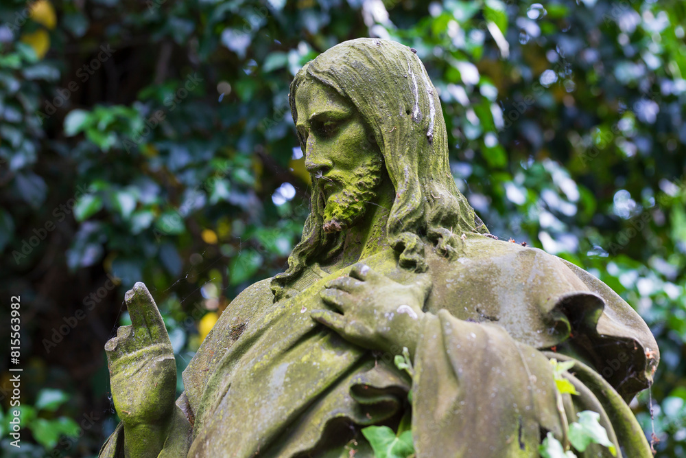 Historic Statue on the mystery old Prague Cemetery, Czech Republic