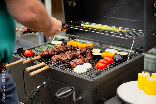 cook meat on the grill, outside barbecue