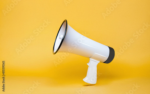 megaphone on a yellow background close-up