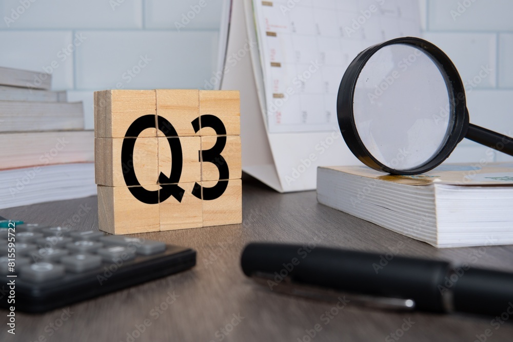 © izzuan - Close up image of wooden cubes with alphabet Q3 on office desk. Third quarter concept. © izzuan - Close up image of wooden cubes with alphabet Q3 on office desk. Third quarter concept.