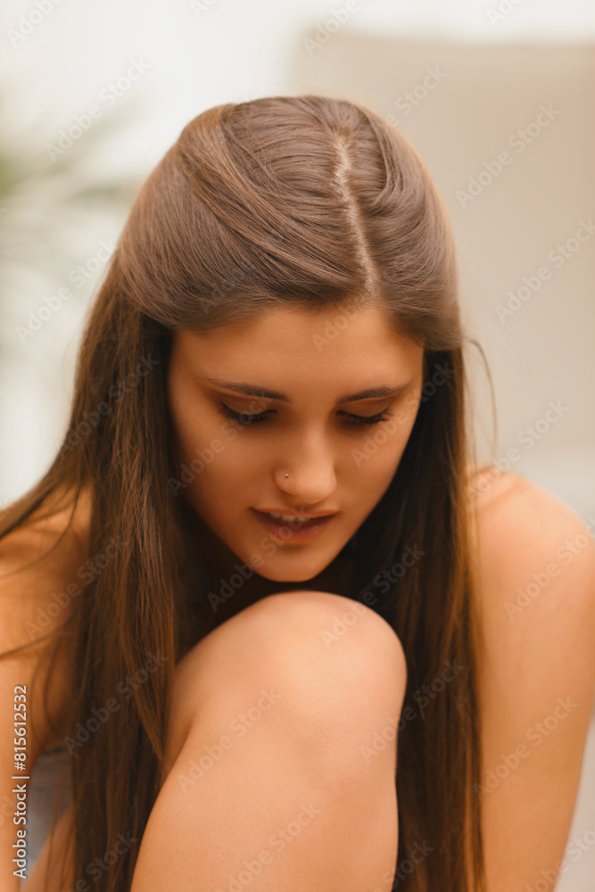 Pensive young lady reflects quietly indoors, serene Pensive young lady reflects quietly indoors, serene