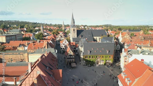 Aerial view of Quedlinburg, town hall in the foreground in beautiful golden evening light, Saxony-Anhalt, Germany. High quality footage in 4k format