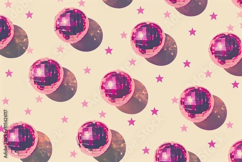 A pattern of pink disco balls with small stars on a beige background photo