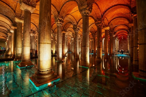 Interior shot of a cisterne in Istanbul with tall columns and a pond in the foreground photo