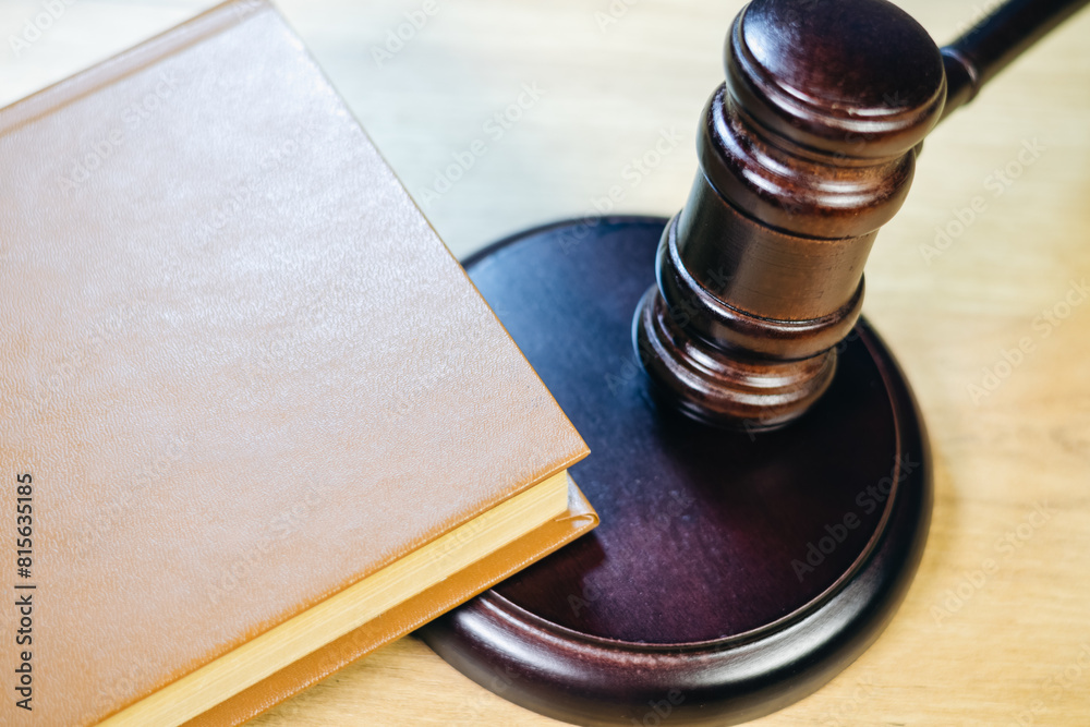 Judge Hammer for adjudication with wooden stand and book on it. Auction or Lawyer decision. Law and justice concept. Court of law. Pronouncing sentence, striking Gavel. Judge Hammer for adjudication with wooden stand and book on it. Auction or Lawyer decision. Law and justice concept. Court of law. Pronouncing sentence, striking Gavel.