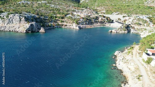 Drone shot of Tatinja Beach in the seaside municipality of Karlobag on the Adriatic coast in Croatia photo