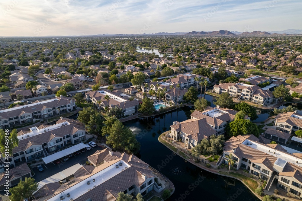 Obraz premium Scenic residential area with green trees. Arrowhead Ranch, Glendale, Arizona, United States