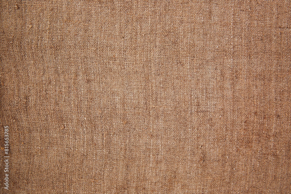 a brown burlock cloth background or texture for design a brown burlock cloth background or texture for design