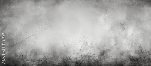 A grunge style black and white background with a faded gray appearance perfect for adding copy space to your image