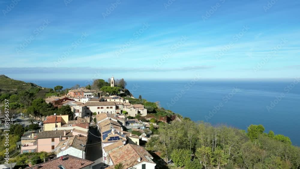 Drone shot of the coastal village of Fiorenzuola di Focara on the Mediterranean sea in Pesaro, Italy Drone shot of the coastal village of Fiorenzuola di Focara on the Mediterranean sea in Pesaro, Italy