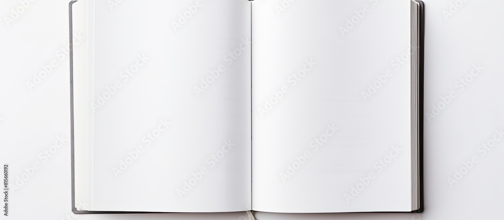 Notebook open page on white table background School study and education concept image blank new notebook close up opened notepad low angle view. copy space available Notebook open page on white table background School study and education concept image blank new notebook close up opened notepad low angle view. copy space available
