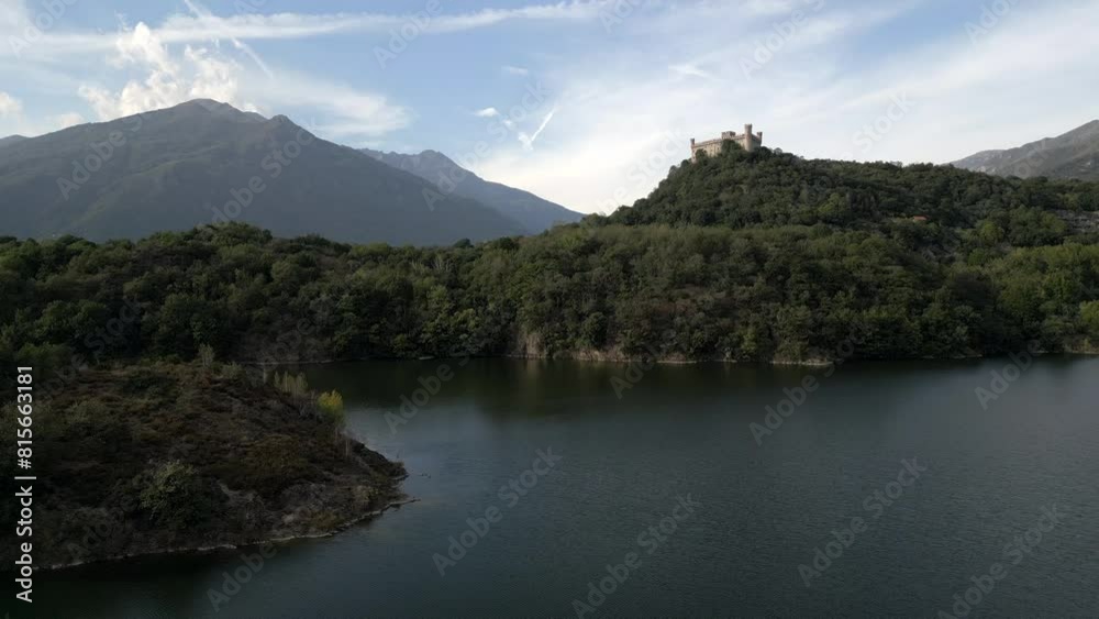 Aerial view, beautiful castle above the hill. Pistono lake. Landscape Italy. Panning 4K Aerial view, beautiful castle above the hill. Pistono lake. Landscape Italy. Panning 4K