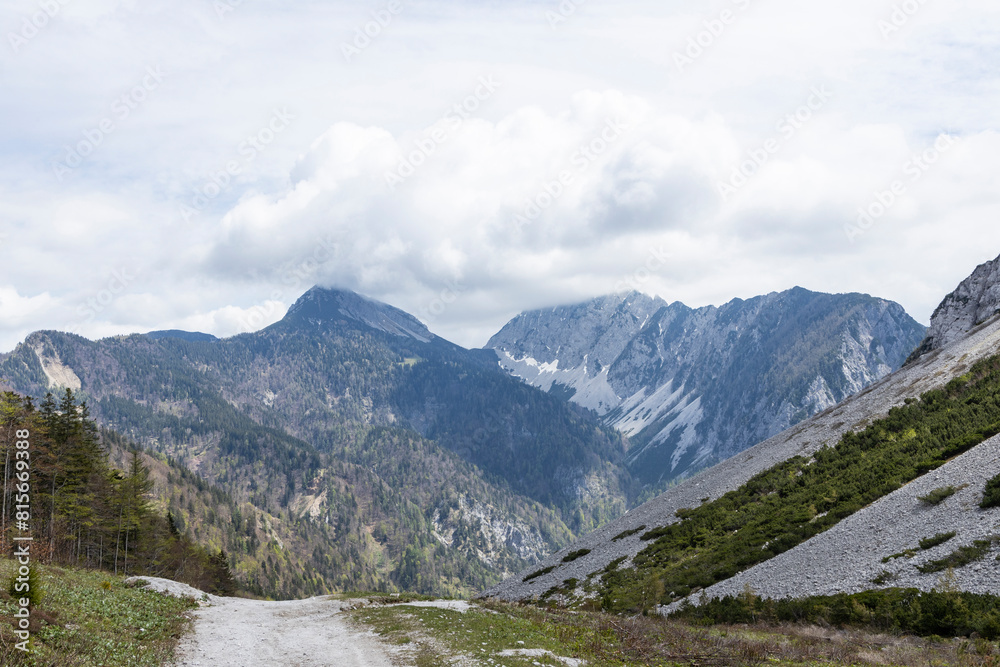 Begunjščica panorama of mountain trekking to the highest peak. View of the Alps, climbing with via ferrata. Distant view of Lake Bled from above. Sports holidays, life of adventure in the countryside. Begunjščica panorama of mountain trekking to the highest peak. View of the Alps, climbing with via ferrata. Distant view of Lake Bled from above. Sports holidays, life of adventure in the countryside.