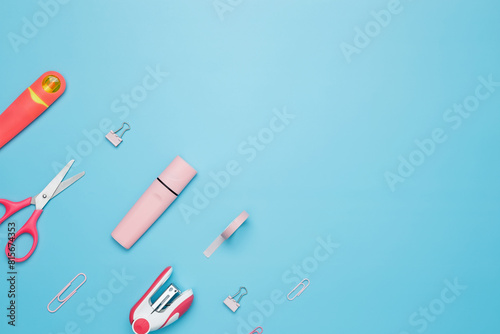 Various school office  on blue background. Back to school concept. Top view