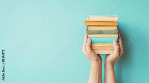 hand holding books