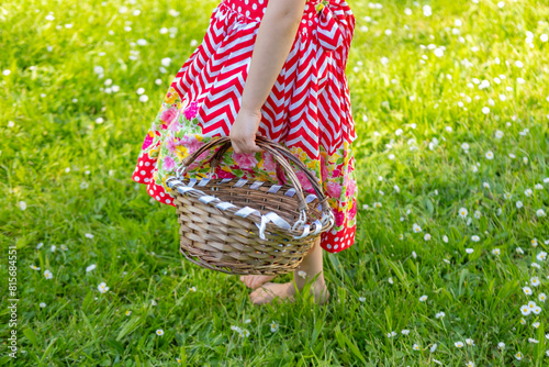 young Barefoot forager discovers wonders of forest floor with wicker basket in hand, Simple joys childhood, Child's exploration forest creates lifetime of nature appreciation