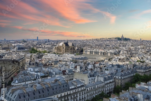 Aerial shot of the beautiful cityscape of Paris during the sunset © Wirestock