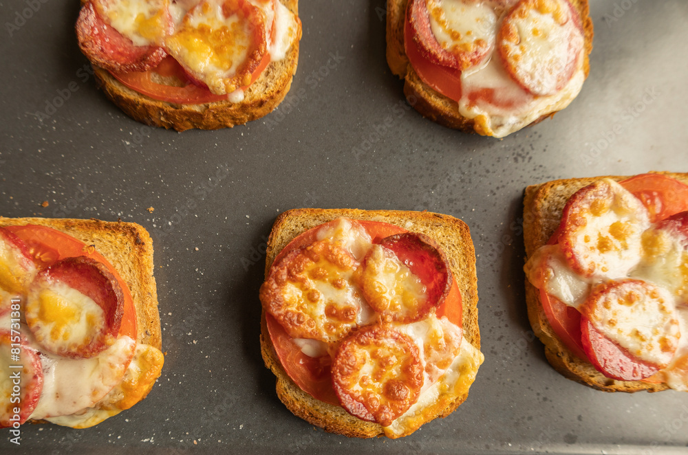 Delicious Toast with Tomato, Salami, and Cheese Close Up Delicious Toast with Tomato, Salami, and Cheese Close Up