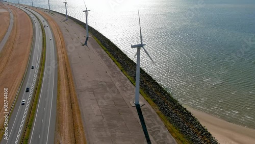 Aerial view of clean power generating wind turbines. photo