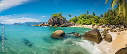 Picturesque tropical beach with coastal rocks
