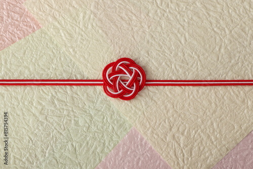 水引飾りの和風背景　梅結び　背景もみ紙使用