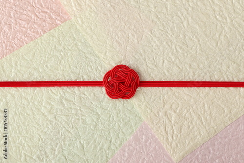 水引飾りの和風背景　梅結び　背景もみ紙使用