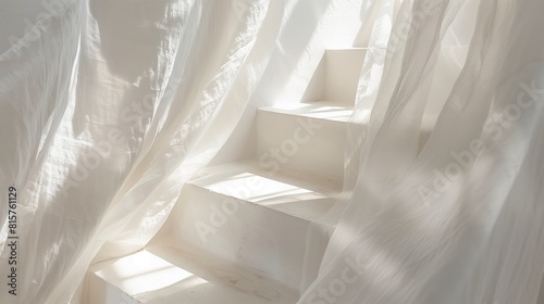 White linen fabric draped over a white staircase. photo