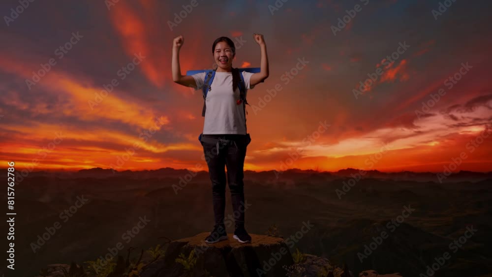 Full Body Of Asian Female Hiker With Mountaineering Backpack Screaming Goal Celebrating The Success While Standing On The Top Of Mountain During Sunset Time Full Body Of Asian Female Hiker With Mountaineering Backpack Screaming Goal Celebrating The Success While Standing On The Top Of Mountain During Sunset Time