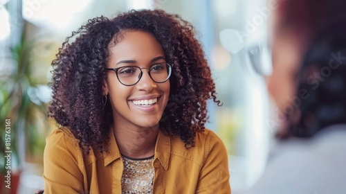 Smiling Female Manager Interviewing an Applicant In Office. 