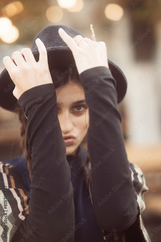 An enchanting portrayal of a trendy young woman embracing retro hippie fashion. An enchanting portrayal of a trendy young woman embracing retro hippie fashion.