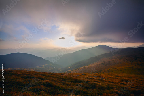 Beautiful sunset in Carpathian mountains in foggy weather , around Shpytsi rocks,  Ukraine photo