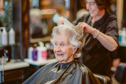 Old woman having a haircut at the hairdresser