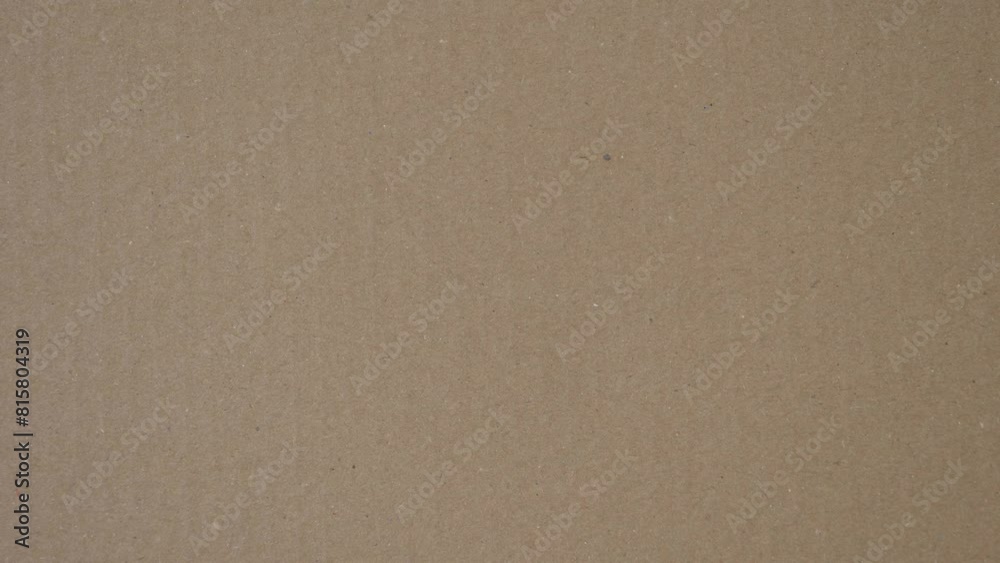 Brown corrugated cardboard paper texture background. Top view. Stop motion animation, 4k video Brown corrugated cardboard paper texture background. Top view. Stop motion animation, 4k video