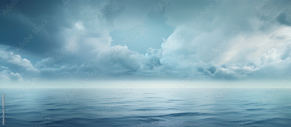 Over the sea the cloudy sky provides a backdrop with rain clouds hovering above the water. Copyspace image Over the sea the cloudy sky provides a backdrop with rain clouds hovering above the water. Copyspace image