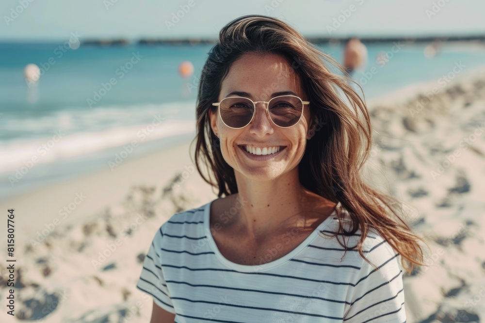 Happy middle aged woman enjoying beach in casual attire. Happy middle aged woman enjoying beach in casual attire.
