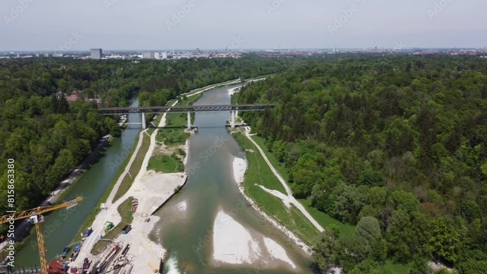 Aerial drone footage of railway bridge over the Isar river in Munich