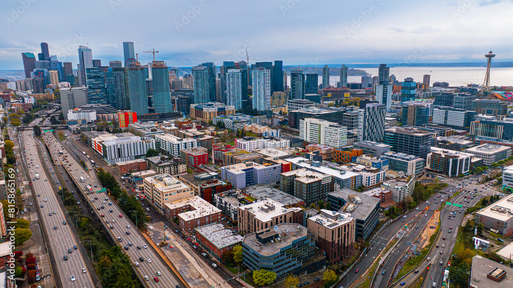 Naklejka premium Modern architecture of stunning metropolis from drone footage. Spectacular skyscrapers standing out in the scenery of Seattle, Washington, the USA.