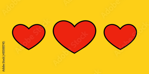 Vibrant image featuring three red hearts aligned in a row against a bright yellow backdrop, perfect for representing love, affection, and celebrations of relationships photo