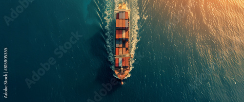 A cargo ship cuts through the sparkling sea, leaving a white trail in its wake. Generative AI