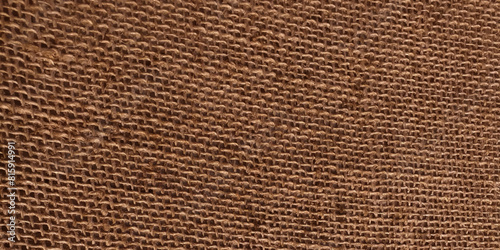 Close-up of fabric woven from burlap. Natural eco-friendly hessian fabric detail.