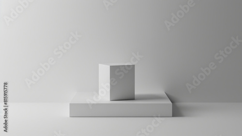 A simple and clean design featuring a white cube placed symmetrically on a raised platform against a light background.
