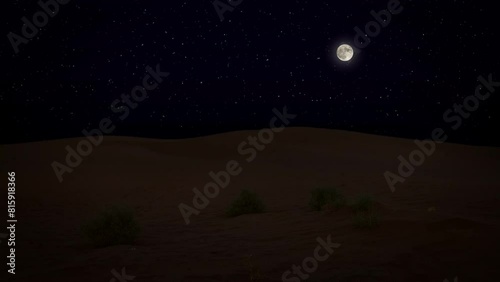 A footage of the desert at night with beautiful stars in the bright sky and a beautiful moon in the sky above the sand dunes and flowing dunes. photo