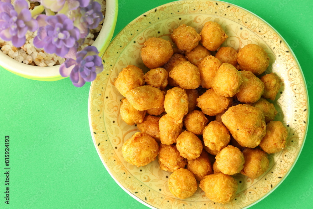 Malaysian delicious snack with a traditional legendary recipe featuring ground peanuts, spice powder, sesame seeds, and more. Homemade, fried, and served, found at your convenience store.