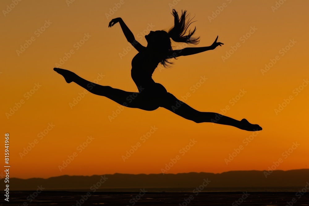 Silhouette of Joyful Dancer Leaping - Expression of Freedom and Achievement