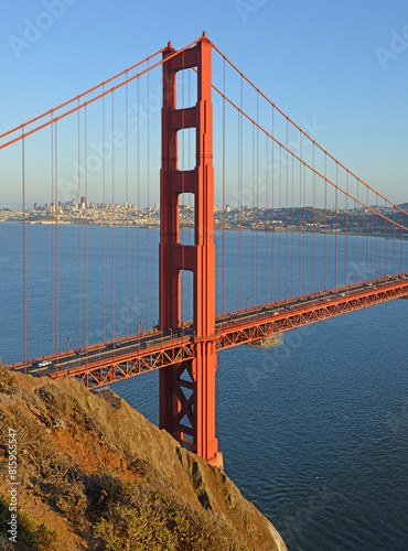 View of Golden Gate Bridge (fragment) from Marin Headlands in evening. San Francisco, California