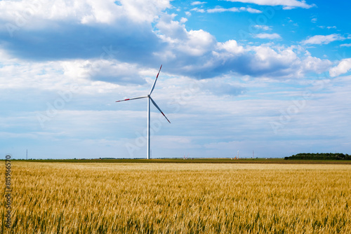 Wind Turbine on wheat fied photo