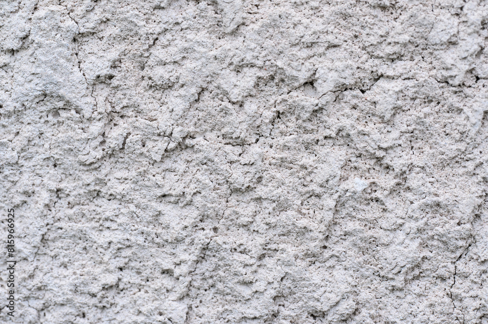 Light background, uneven cement floor texture, concrete texture, with visible mortar texture.