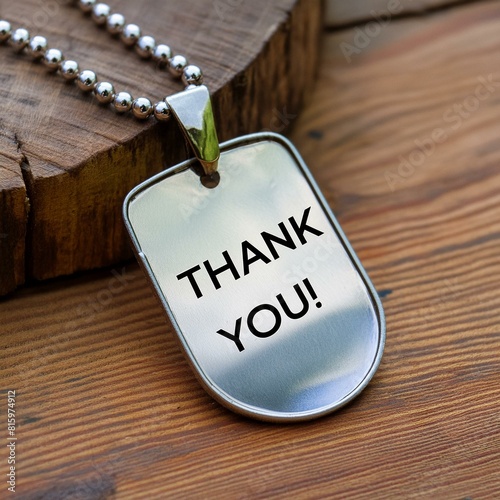 a military dog tag positioned on a wooden surface, featuring the words 